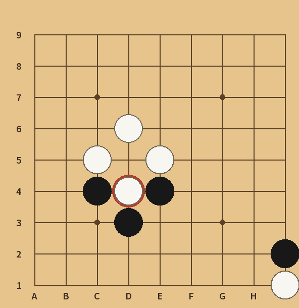 백 J1·흑 J2 교환 뒤 백 D4로 되따낸 자리